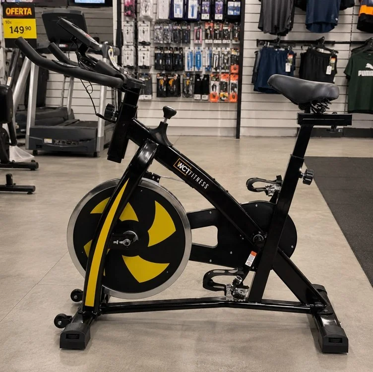 🚀 Bicicleta Ergométrica WCT Fitness Spinning Roda Inércia 13Kg Preto Amarelo Uso Doméstico Bike Exercício em Casa Sensor Cardíaco Ajuste Altura Resistência